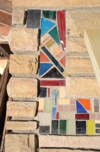 This colorful mosaic is on a pillar in the living room.